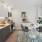 a kitchen with a table and chairs