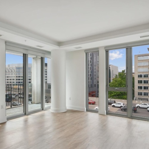 Relax and unwind in well-lit living areas a room with large windows