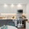 a kitchen with grey cabinets