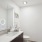 a bathroom with a large mirror