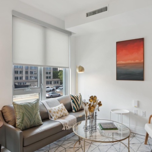 Beautiful living areas to match your lifestyle a living room with a couch and a coffee table