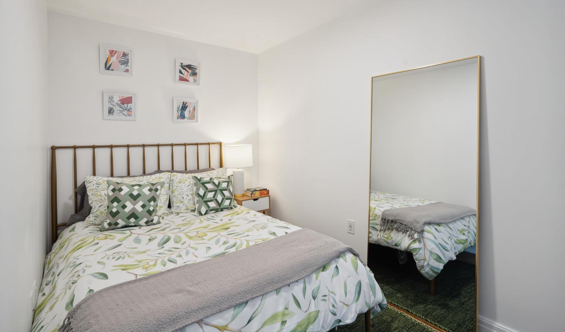 Sleep in style a bedroom with a large mirror
