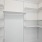 a closet with many shelves
