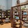 a room with shelves and books